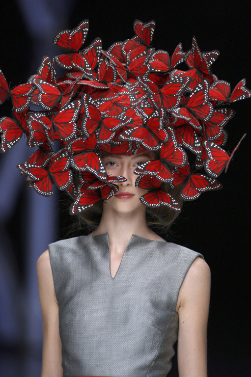 2._Butterfly_headdress_of_hand-painted_turkey_feathers_Philip_Treacy_for_Alexander_McQueen_La_Dame_Bleu_Spring_Summer_2008_copyright_Anthea_Sims